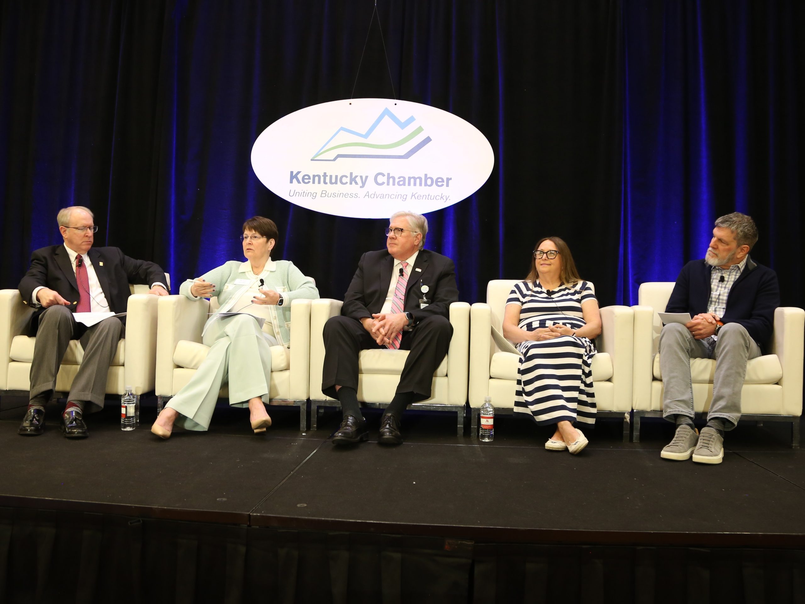 Healthcare leaders sit on stage during a panel discussion on artificial intelligence at the Kentucky Chamber of Commerce’s Healthcare Innovation Summit.