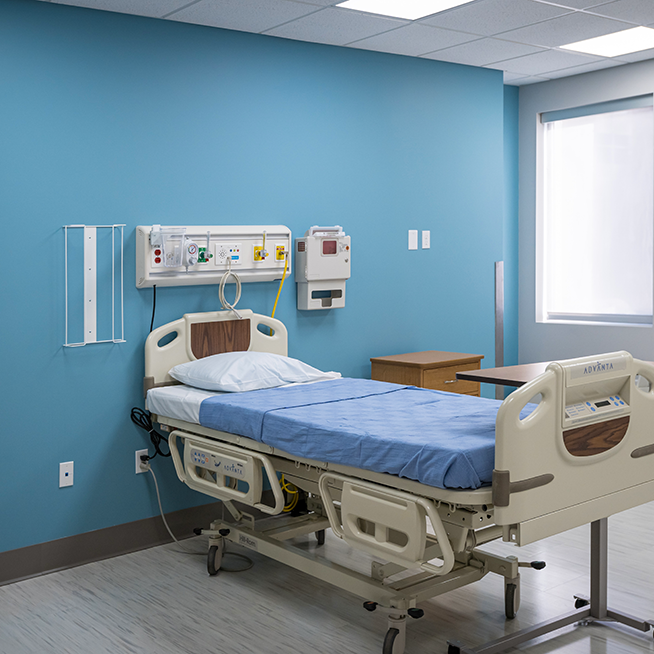 an empty hospital bed at the Galen Hazard simulation lab