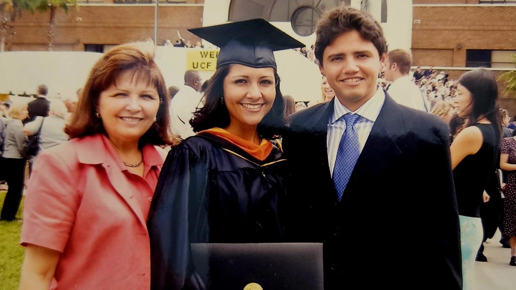 Karla Moore at her Master’s Degree graduation with mother Rosa (Left) and brother Felix (right) in Orlando, Fla.
