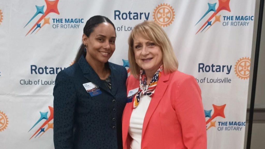 Paris Parada and mentor at a Rotary Club of Louisville event